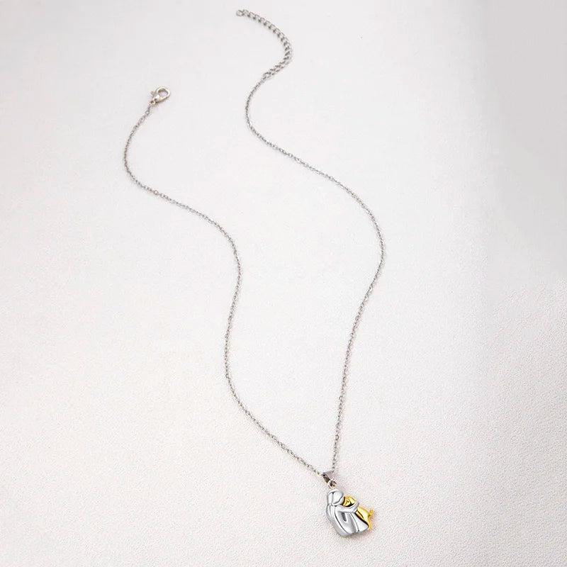 Cute, Two-Tone Girl Hugging Dog Necklace